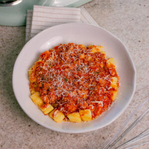 Gnocchi de mandioquinha al Ragú de linguiça