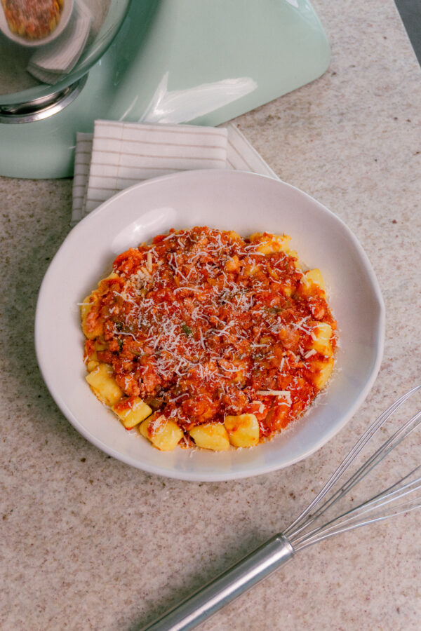 Gnocchi de mandioquinha al Ragú de linguiça